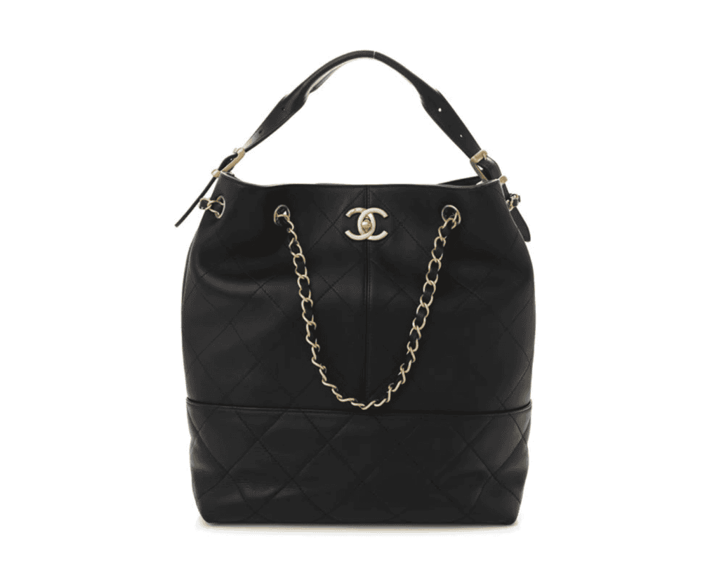 Chanel 25 medium hobo bag in black quilted caviar leather featuring a flat leather top handle, an interlocking gold CC drawstring charm, and a decorative woven chain.