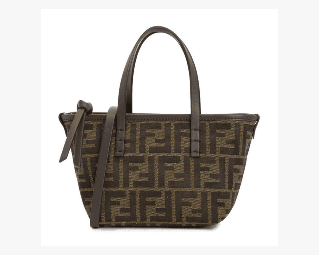 A small trapezoidal Fendi Origami tote bag made of brown and black FF logo jacquard fabric, featuring dark brown leather top handles, a matching slim leather shoulder strap, and leather side drawstrings with a knotted tie detail.